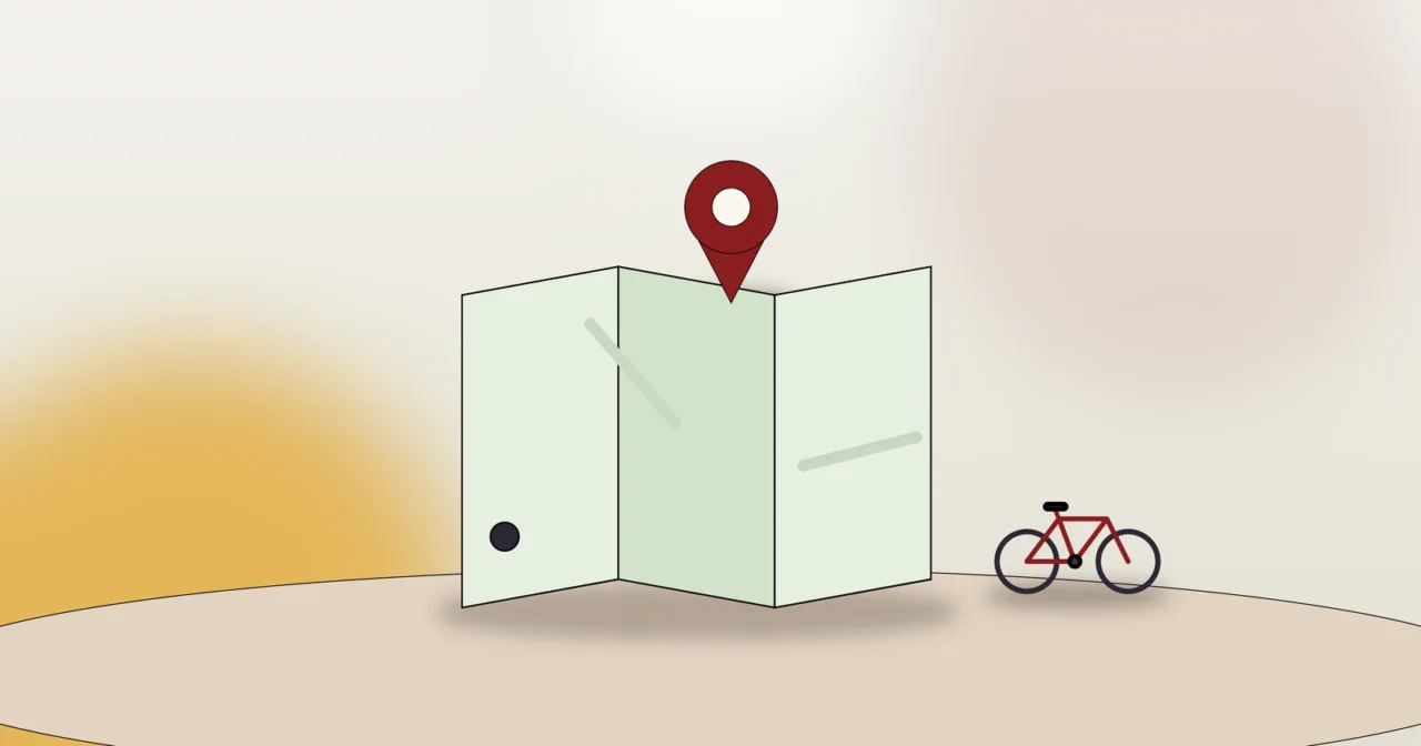 Faltkarte mit markierter Route und Standort-Pin als Symbol für das Erkunden des neuen Kiezes
